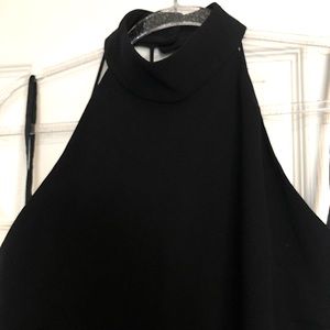 Pretty black dress, high neck closes on back with 2 buttons.